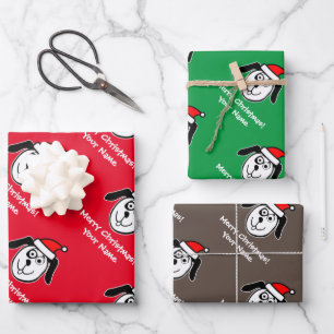 Drôle Père Noël chien feuilles de papier d'emballa