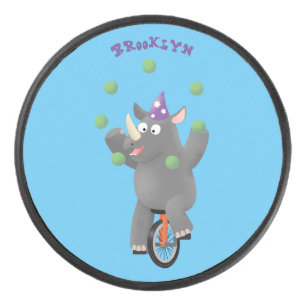 Drôle rhinocéros mignon jonglant sur monocycle