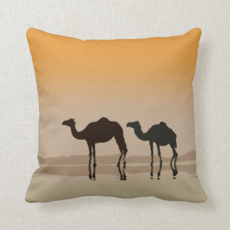 Dromedary camels and a mirage throw pillow
