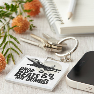 Drop Beats Not Bombs Fighter Jet Vinyl Keychain