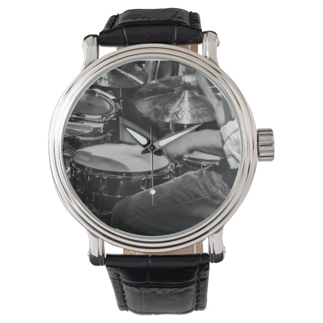 Drummer at work keeping time watch (Front)