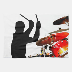 Drummer sticks in air shadow real drums kitchen towel