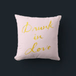 Drunk in Love Pink & Gold Outdoor Pillow<br><div class="desc">This fun and flirty outdoor pillow is accented with the saying "Drunk in Love" in a bold gold brush stoke on a soft pink background,  making it the perfect accessory for the couple's table at an outdoor wedding,  or the newlywed's deck,  patio or porch.</div>