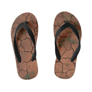 dry, cracked ground kid's flip flops