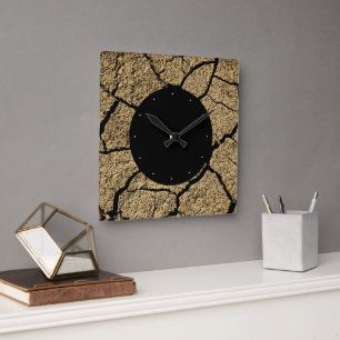Dry land with cracked earth in drought square wall clock