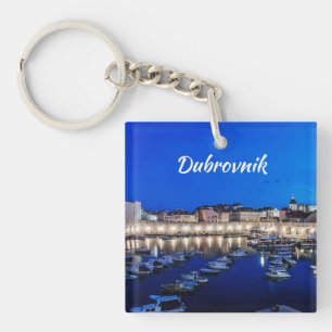 Dubrovnik harbor and walls illuminated at night keychain