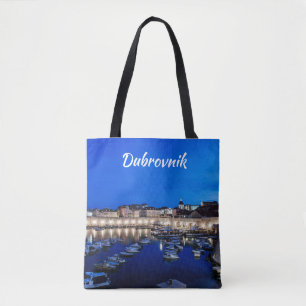 Dubrovnik harbor and walls illuminated at night tote bag