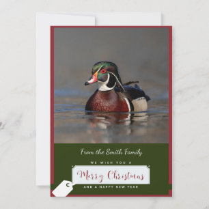 Duck de bois tiré sur une carte de Noël