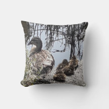 Duck family on the canal throw cushion.