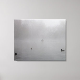 Ducks on a foggy lake canvas print