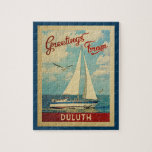 Duluth Sailboat Vintage Travel Minnesota Jigsaw Puzzle<br><div class="desc">This Greetings From Duluth Minnesota vintage travel nautical design features a boat sailing on the water with seagulls and a blue sky filled with gorgeous puffy white clouds.</div>