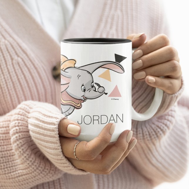 Dumbo Tribal Design Two-Tone Coffee Mug (Person holding mug)