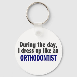 During The Day I Dress Up Like An Orthodontist Keychain