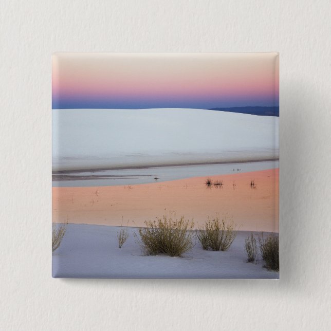 Dusk sky reflected in pool of water from 2 inch square button (Front)