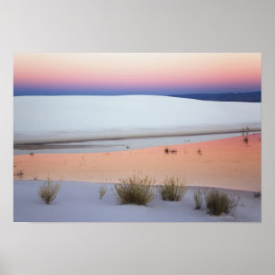 Dusk sky reflected in pool of water from poster