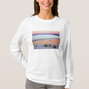 Dusk sky reflected in pool of water from T-Shirt