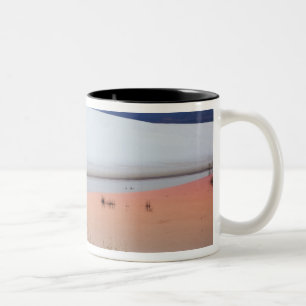 Dusk sky reflected in pool of water from Two-Tone coffee mug