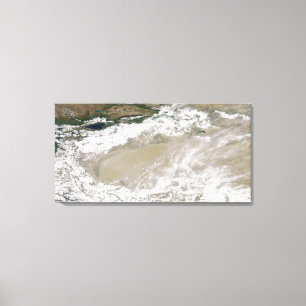 Dust and clouds hovered over the Taklimakan Des Canvas Print