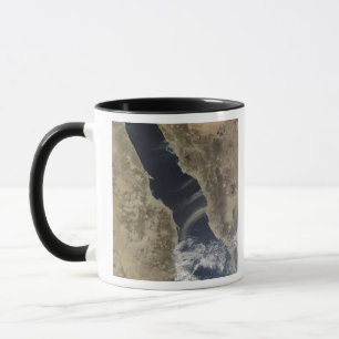 Dust plumes blow off the coast of Saudi Arabia Mug