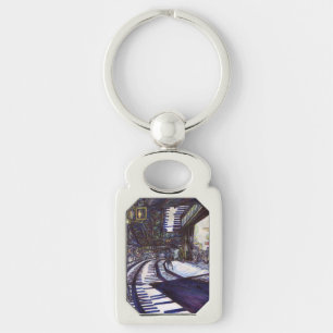Dusting the Piano Keychain