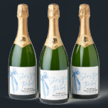 Dusty Blue Bow She's Tying the Knot Bridal Shower  Sparkling Wine Label<br><div class="desc">Celebrate the bride-to-be with the "She's Tying the Knot" Bridal Shower theme, elegantly adorned with a dusty blue bow design. This refined and stylish theme sets the perfect tone for a sophisticated bridal shower, blending seamlessly with your event decor. The dusty blue bow adds a touch of grace and charm,...</div>