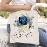 Dusty Blue Champagne Ivory Floral Wedding Bride Tote Bag<br><div class="desc">Dusty blue floral wedding bridesmaid gift totebag featuring elegant bouquet of navy blue, royal blue , white , gold, champagne ivory, blush colour rose , ranunculus flower buds and sage green eucalyptus leaves and elegant watercolor bouquet. Please contact me for any help in customization or if you need any other...</div>