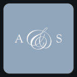 Dusty Blue Monogram Wedding Square Sticker<br><div class="desc">Elevate your wedding stationery with our Dusty Blue Monogram Wedding Square Sticker, a perfect blend of classic elegance and modern simplicity. Set against a soft, dusty blue background, this square sticker features the couple’s initials delicately intertwined by an elegant handwritten "&" symbol in the centre. The minimalistic design, combined with...</div>