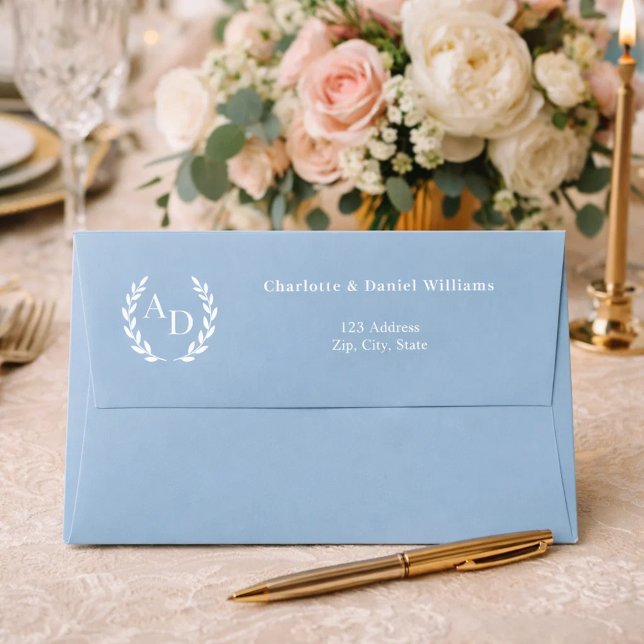 Dusty blue monogram wreath return address envelope (Creator Uploaded)