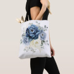 Dusty Blue Navy Champagne Ivory Floral Wedding Tote Bag<br><div class="desc">Dusty blue floral wedding bridesmaid gift bag featuring elegant bouquet of navy blue, royal blue , white , gold, champagne ivory, blush colour rose , ranunculus flower buds and sage green eucalyptus leaves and elegant watercolor bouquet. Please contact me for any help in customization or if you need any other...</div>