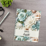 Dusty green cream florals name script planner<br><div class="desc">A dusty green and cream coloured flower pattern.  Personalize and add a year (any year) and your name. The name is written with a modern hand lettered style script</div>