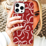 Dusty Red Bow Monogram iPhone 16 Pro Max Case<br><div class="desc">Dress up your phone in style with this chic and trendy dusty red phone case! Featuring a playful pattern of hand-drawn bows and personalized with your monogram, this case is the perfect blend of fashion and function. Made from durable materials to protect your phone from everyday bumps and scratches. A...</div>