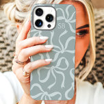 Dusty Sage Bow Monogram iPhone 16 Pro Max Case<br><div class="desc">Dress up your phone in style with this chic and trendy dusty sage phone case! Featuring a playful pattern of hand-drawn bows and personalized with your monogram, this case is the perfect blend of fashion and function. Made from durable materials to protect your phone from everyday bumps and scratches. A...</div>