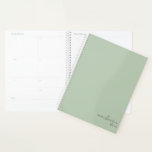 Dusty Sage Green Simple Minimalist Personalized Planner<br><div class="desc">Dusty Sage Green Elegant Simple Minimalist Personalized Notebook featuring your name and year in modern script. Our planner is here to help you achieve your goals. It provides a way to stay organized and reflect on your life. With a simple undated design, you can use this planner for any occasion:...</div>