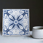 Dutch Delft Blue Daisy Repro Backsplash Kitchen Tile<br><div class="desc">This ceramic tile from the Dutch Delft Blue tradition is a stunning example of artistry and craftsmanship. The tile features a symmetrical floral daisy theme, with a central flower surrounded by smaller leaves. The tile is glazed in the traditional Delft Blue and white colour scheme. Perfect for adding a touch...</div>