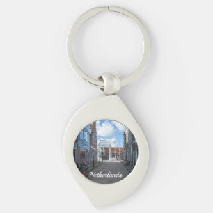 Dutch village with traditional wooden bridge keychain
