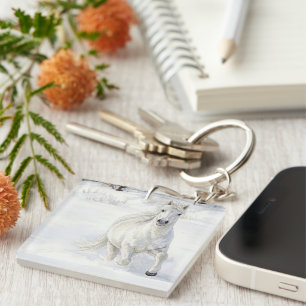 Dyfra the Icelandic Horse Galloping in Snow Keychain
