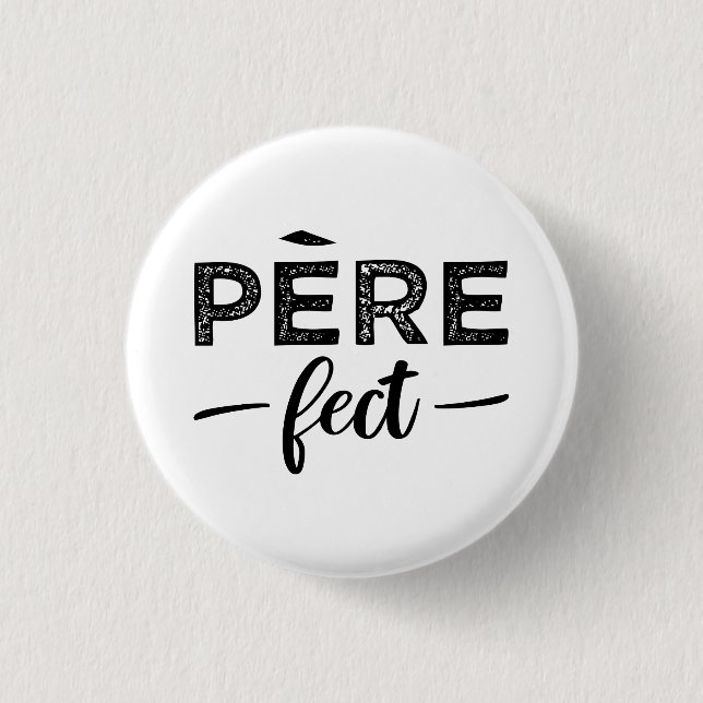 è re-fect 1 inch round button (Front)