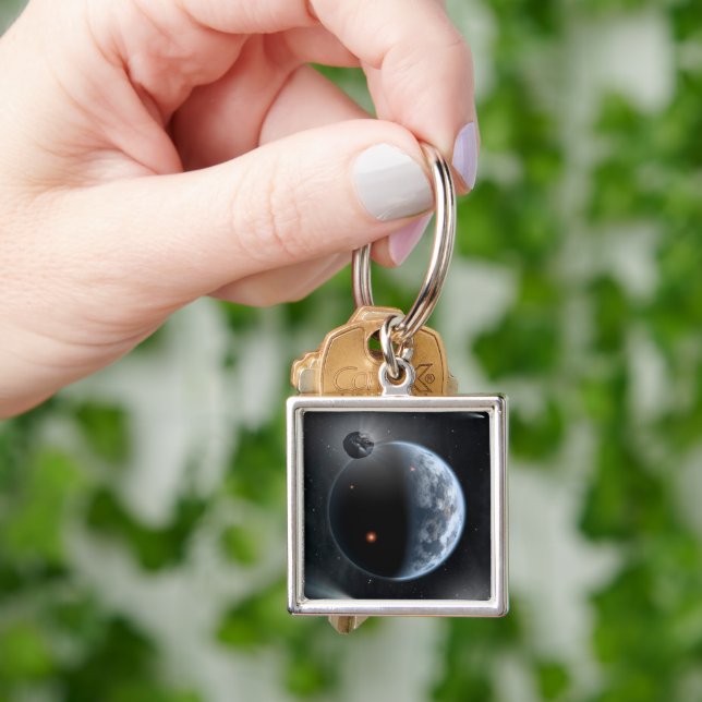Earth-Like Planet With Oceans Coating Its Surface. Keychain (Hand)