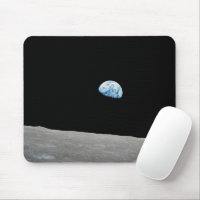 Earth Rising Above The Lunar Horizon.