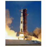 Earth Shakes as Saturn V Blazes Skyward to Moon Standing Photo Sculpture<br><div class="desc">The Earth trembled beneath the colossal thrust of the Saturn V. Buildings swayed precariously as a torrent of flame and fury roared heavenward. The launchpad became a cauldron of churning smoke, momentarily obscuring the behemoth clawing its way towards the inky blackness of space, carrying humanity's dreams on its fiery breath....</div>