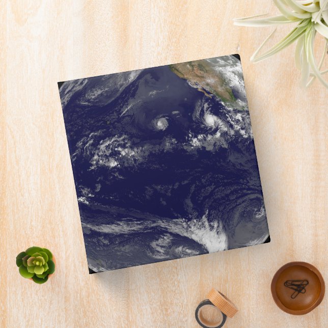 Earth With Three Tropical Cyclones In The Pacific. Binder (In Situ)