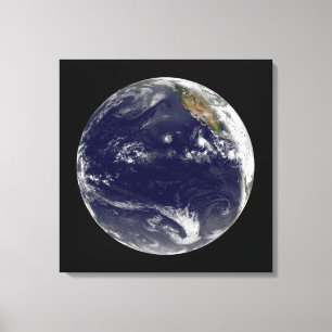 Earth With Three Tropical Cyclones In The Pacific. Canvas Print