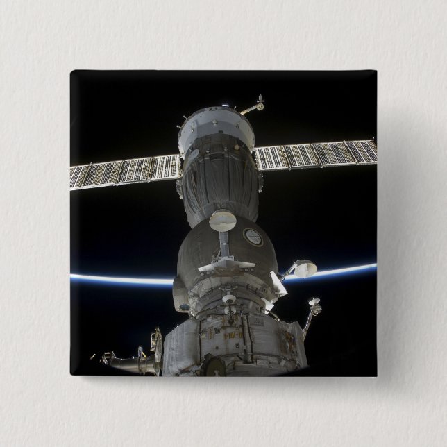 Earth's limb intersects a Soyuz spacecraft 2 Inch Square Button (Front)