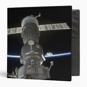 Earth's limb intersects a Soyuz spacecraft Binder