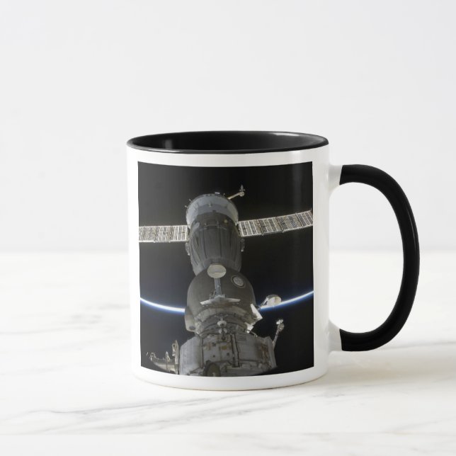 Earth's limb intersects a Soyuz spacecraft Mug (Right)