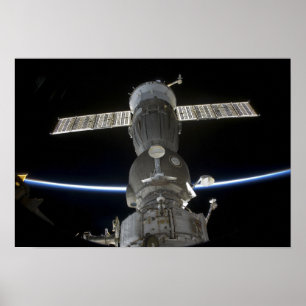 Earth's limb intersects a Soyuz spacecraft Poster
