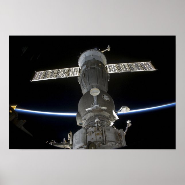 Earth's limb intersects a Soyuz spacecraft Poster (Front)