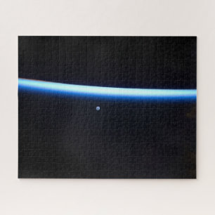 Earth's Thin Line Of Atmosphere And A Gibbous Moon Jigsaw Puzzle