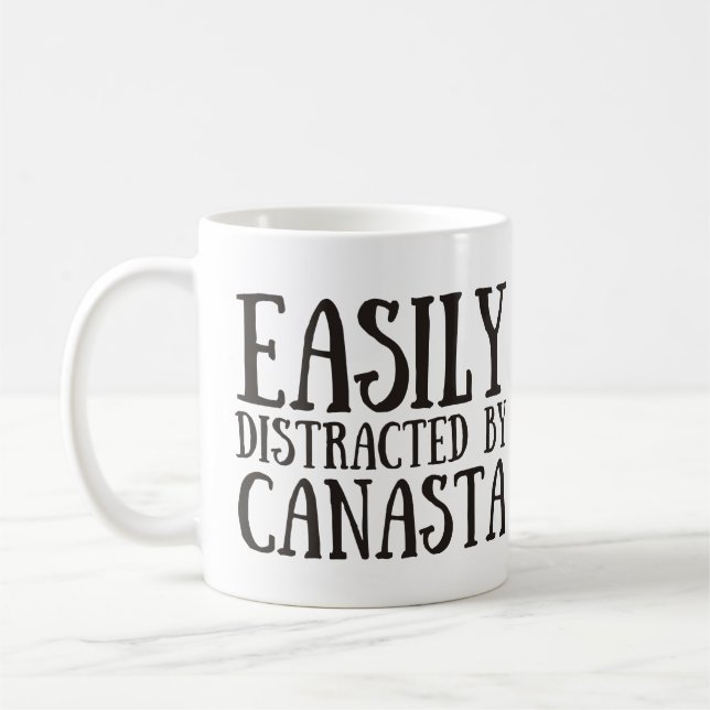 Easily distracted by canasta coffee mug (Left)