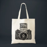 East German Camera - Black Tote Bag<br><div class="desc">A bag with a high contrast, high passed filtered and vectorized image of a vintage East German camera from the 1950s. Creating a strong bold toothy retro screen print. or medieval Gothic brass rubbing like effect.</div>